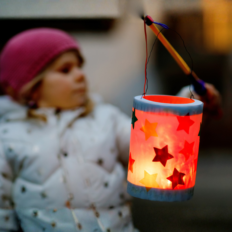 Girl with a glowing paper lantern