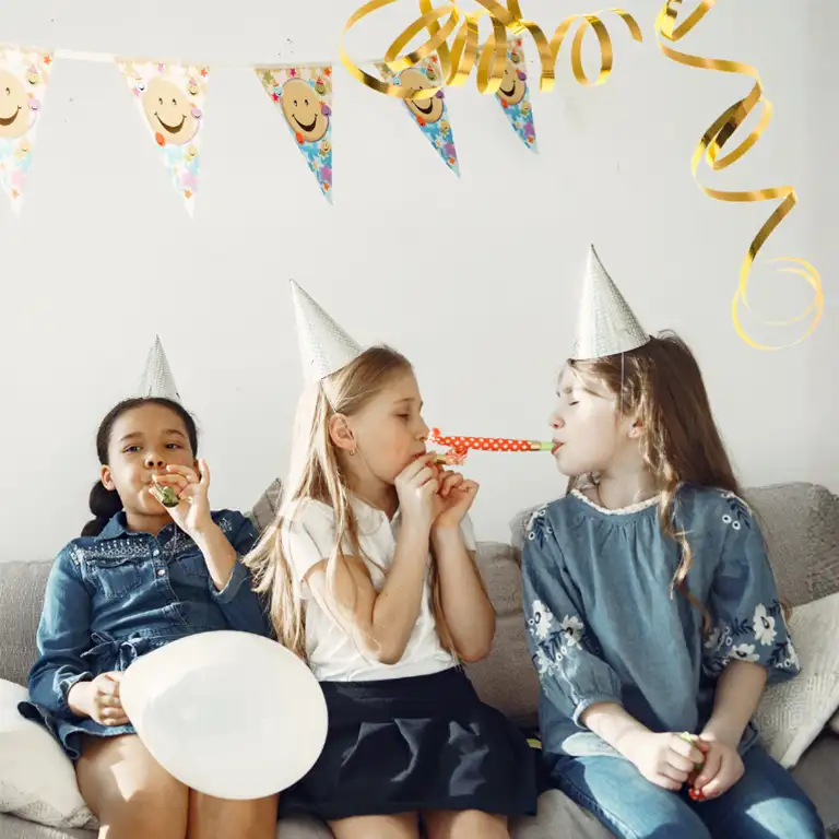 Carnival Children with party hats celebrate carnival, for example