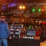 Ascension Day DJ on stage in front of an audience